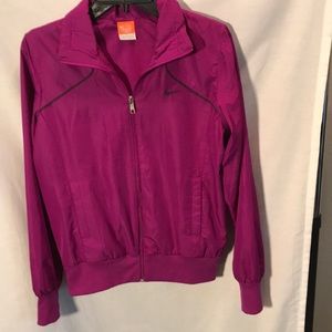 Nike ladies size M plum colored athletic jacket